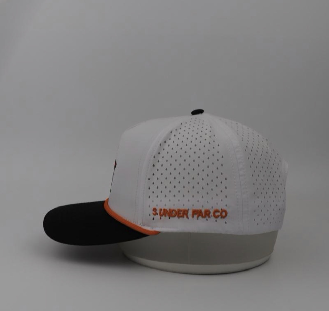 3 Under Par Co "Golden Birdie" Edition Golf Hat - White/Black with Perforated Design and Orange Trim view 4