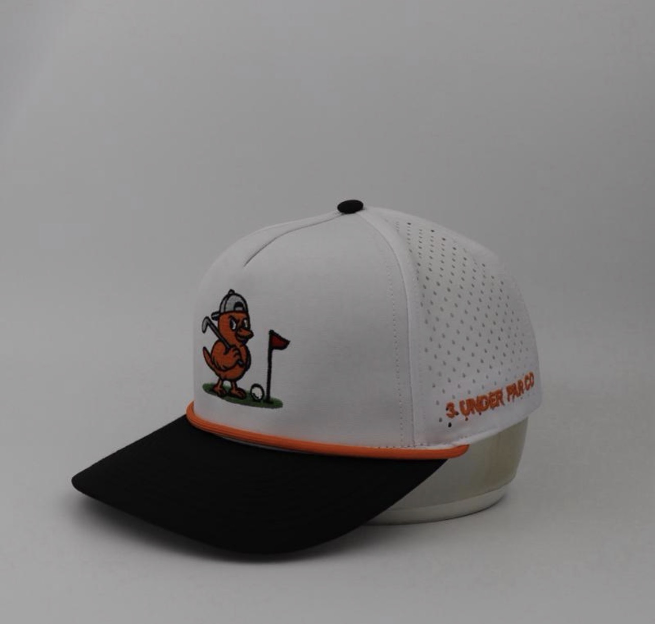 3 Under Par Co "Golden Birdie" Edition Golf Hat - White/Black with Perforated Design and Orange Trim view 2